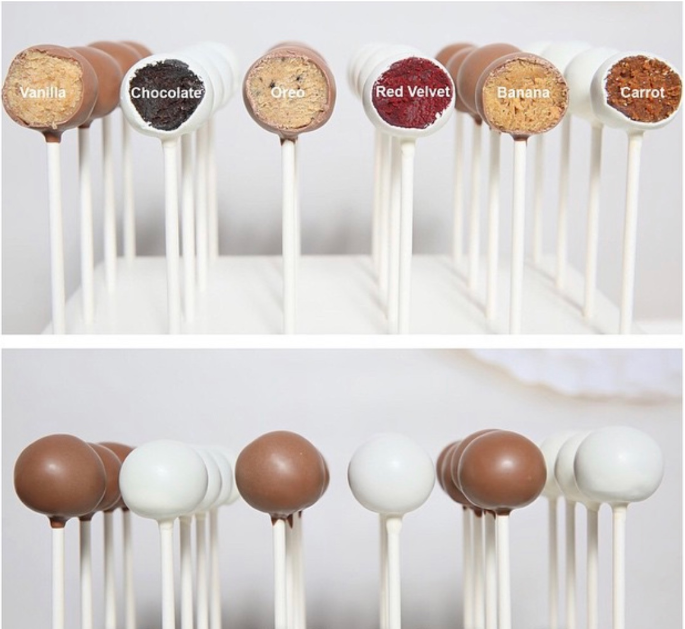 cake pops cut in half to show inside color and labeled with their flavor